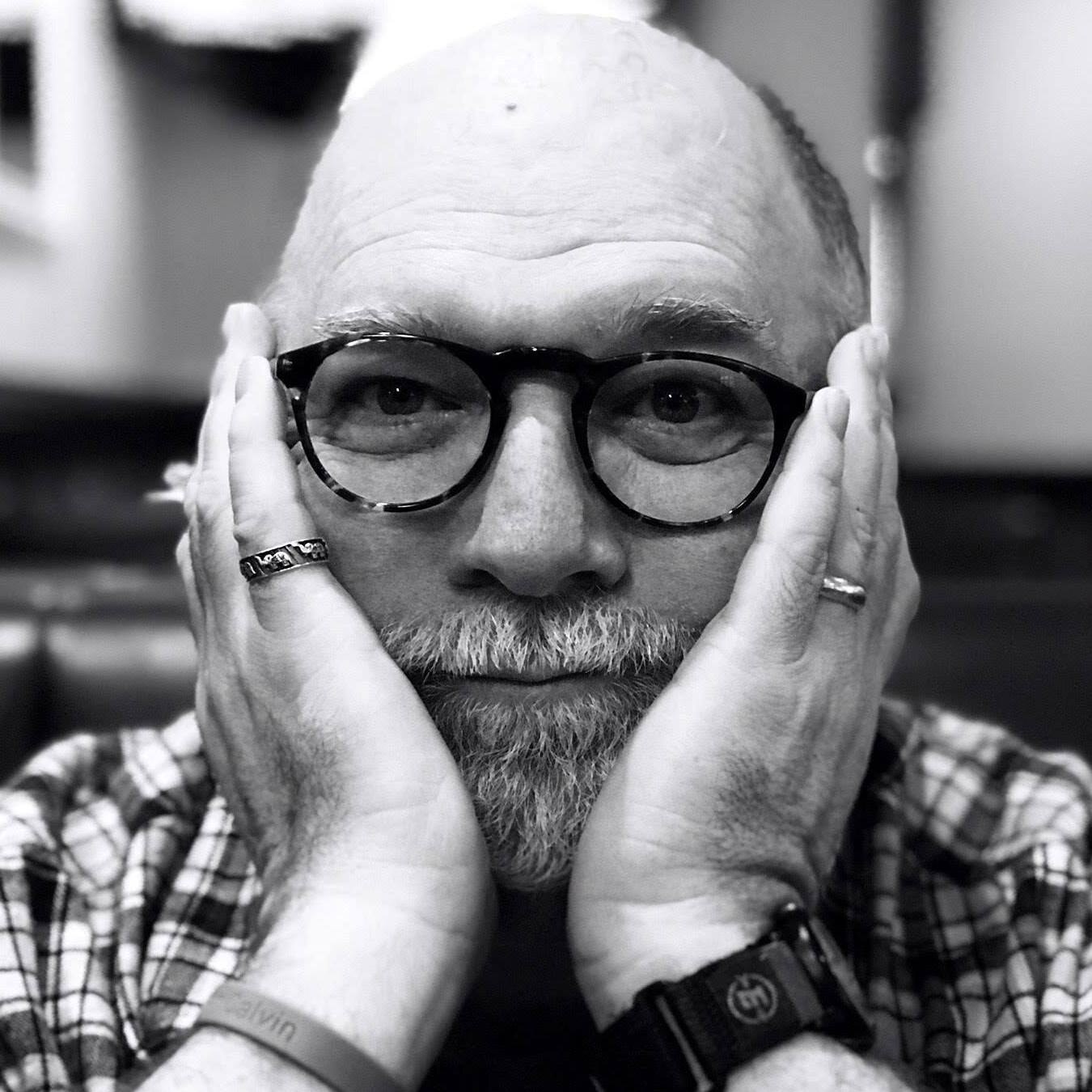 David Atwood, voiceover artist, in his round glasses